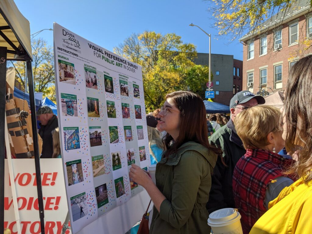 Woman participating in a visual preference survey at Dover Apple Harvest Day
