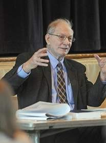 SRPC Commissioner Ed Jansen animatedly speaking at a meeting