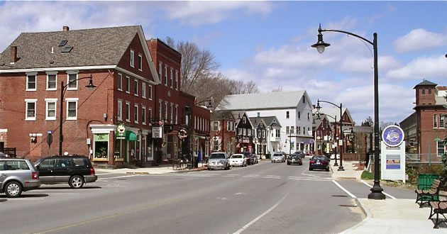Downtown Newmarket NH with shop along the main street