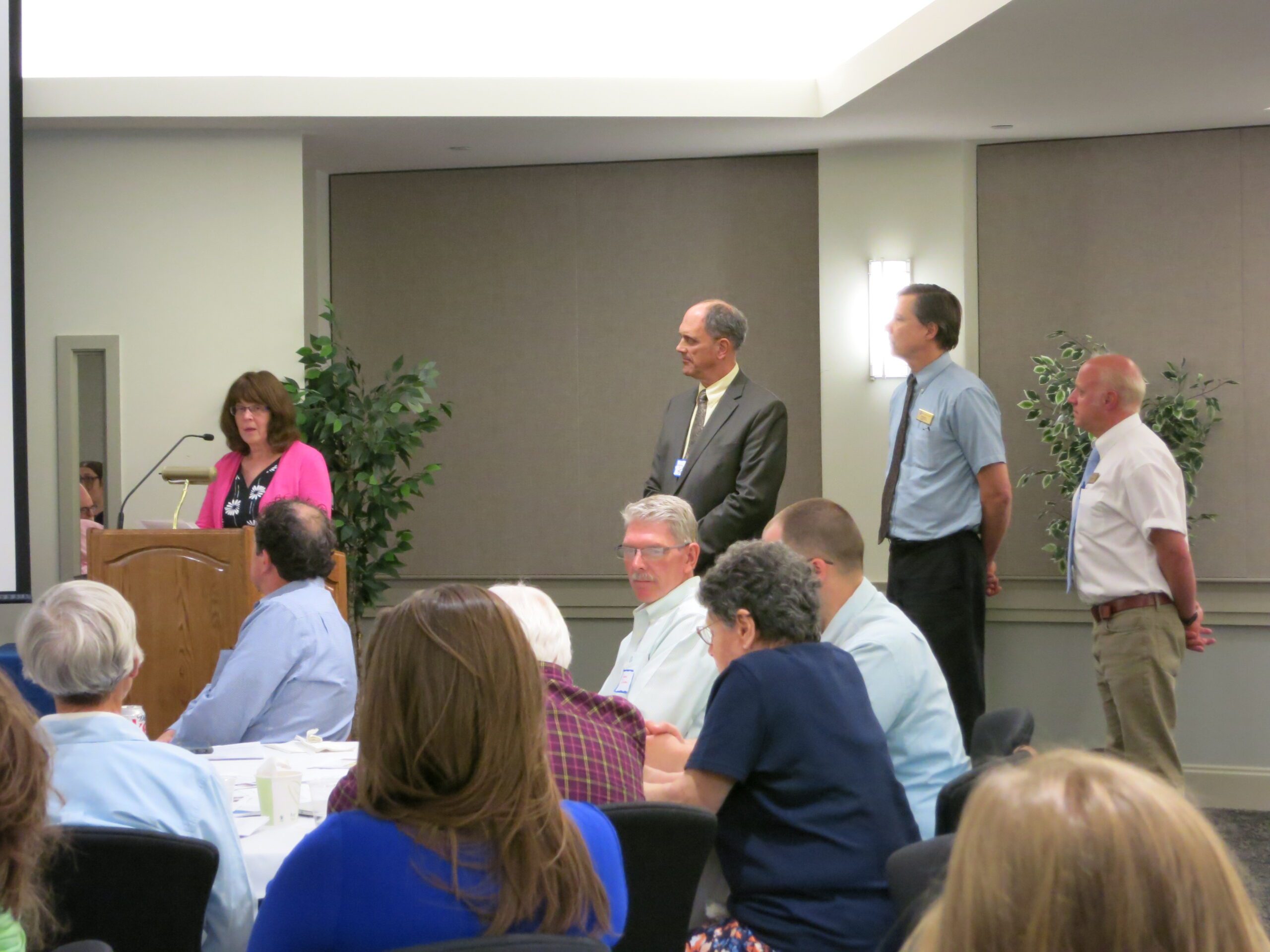 Executive Director Cynthia Copeland present the 2016 planning award to the UNH Planning Department