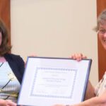 Executive Director Cynthia Copeland present the 2017 planning award to Digit Taylor and LCHIP