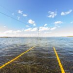 A flooded parking lot during a King Tide event
