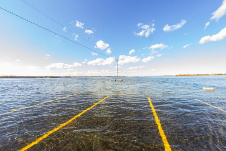 A flooded parking lot during a King Tide event