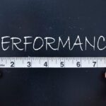 Graphic showing a ruler with the word "performance"