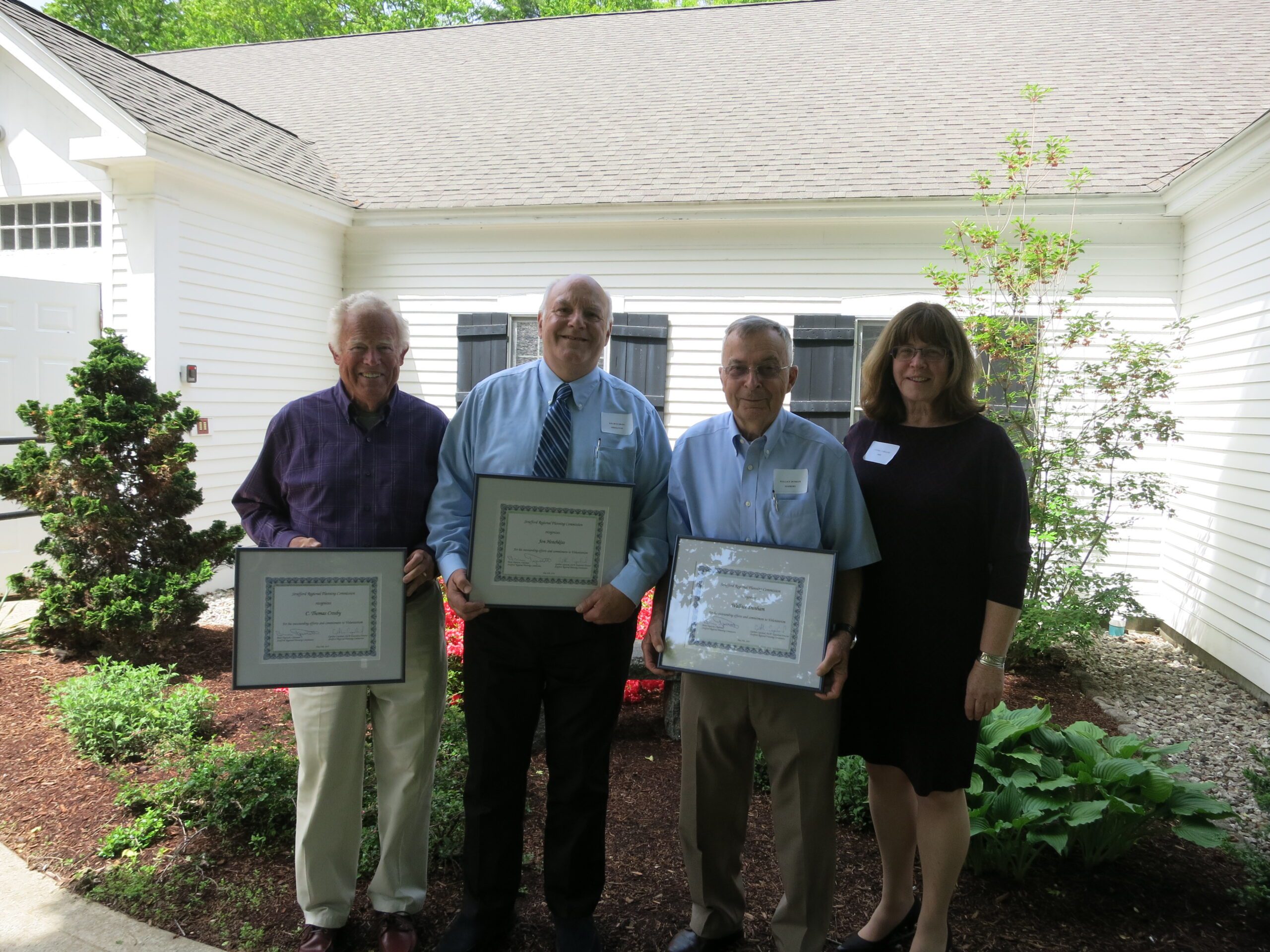 SRPC Executive Director Cynthia Copeland poses with the winners of the annual award in from of the Madbury Town Hall