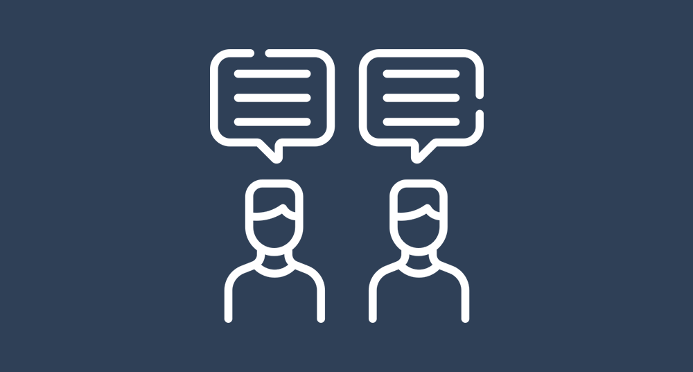 Graphic of two people each with a chat bubble above their head