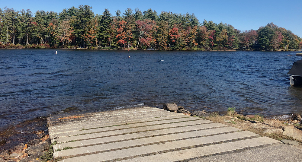 Concrete boat launch on Bow Lake, with foliage